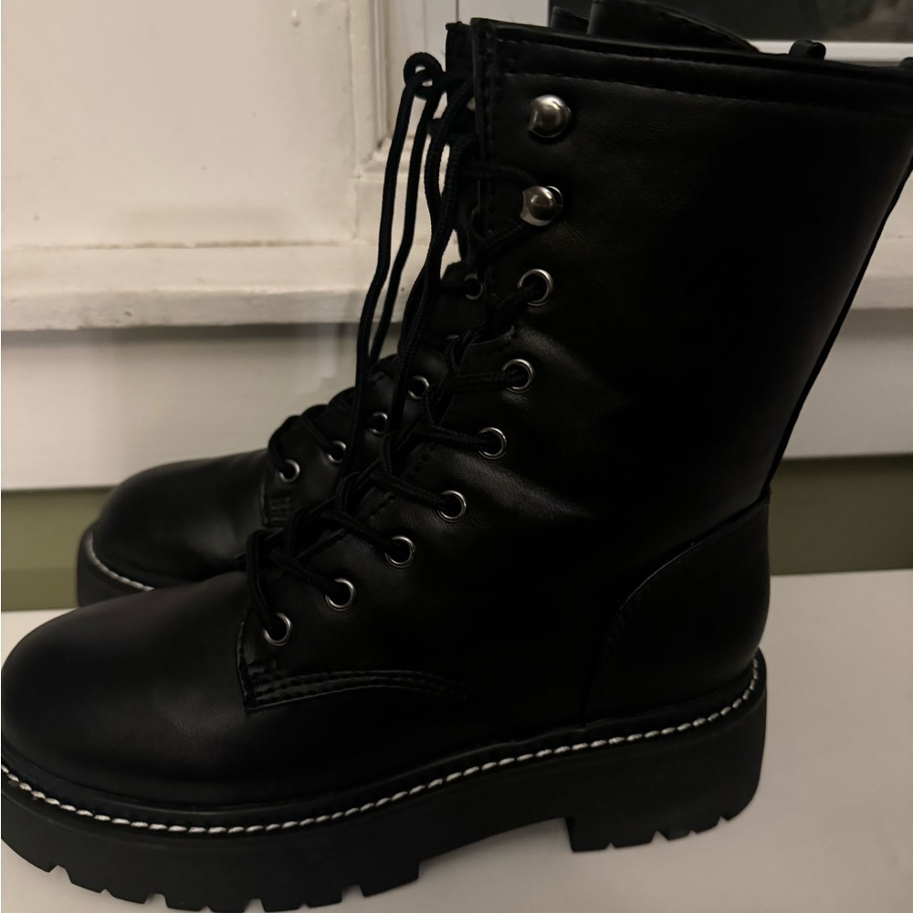 A new day black boots